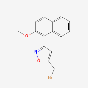 molecular formula C15H12BrNO2 B1528704 5-(Bromomethyl)-3-(2-methoxynaphthalen-1-yl)-1,2-oxazole CAS No. 1432679-47-4