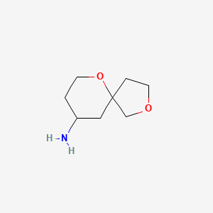 molecular formula C8H15NO2 B1528785 2,6-Dioxaspiro[4.5]decan-9-amine CAS No. 1343024-86-1
