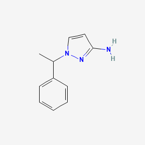 molecular formula C11H13N3 B1528938 1-(1-phenylethyl)-1H-pyrazol-3-amine CAS No. 1240564-34-4