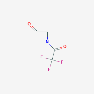molecular formula C5H4F3NO2 B1528990 1-(2,2,2-Trifluoroacetyl)azetidin-3-one CAS No. 1803610-57-2
