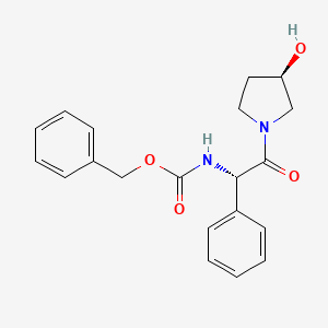 molecular formula C20H22N2O4 B15292898 N-[(1S)-2-[(3R)-3-Hydroxy-1-pyrrolidinyl]-2-oxo-1-phenylethyl]-carbamic Acid Phenylmethyl Ester 