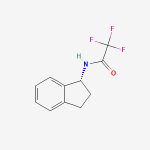 molecular formula C11H10F3NO B15293668 (R)-N-Trifluoroacetyl-1-aminoindan 
