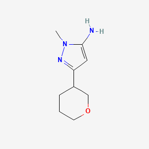 molecular formula C9H15N3O B1529389 1-methyl-3-(oxan-3-yl)-1H-pyrazol-5-amine CAS No. 1339351-19-7