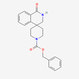 molecular formula C21H22N2O3 B1529554 benzyl 1-oxo-2,3-dihydro-1H-spiro[isoquinoline-4,4'-piperidine]-1'-carboxylate CAS No. 1330763-54-6