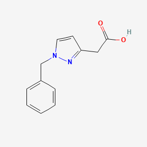 molecular formula C12H12N2O2 B1529981 2-(1-Benzyl-1H-pyrazol-3-yl)acetic acid CAS No. 1194803-69-4