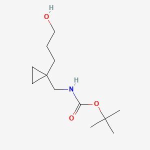 molecular formula C12H23NO3 B15301021 tert-butyl N-{[1-(3-hydroxypropyl)cyclopropyl]methyl}carbamate 