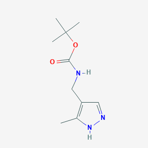 molecular formula C10H17N3O2 B1530161 TERT-BUTYL N-[(3-METHYL-1H-PYRAZOL-4-YL)METHYL]CARBAMATE CAS No. 1183233-93-3