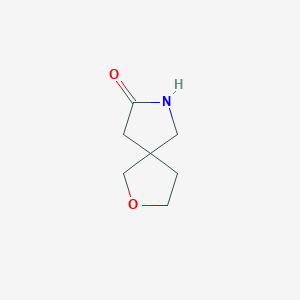 B1530342 2-Oxa-7-azaspiro[4.4]nonan-8-one CAS No. 1384427-76-2