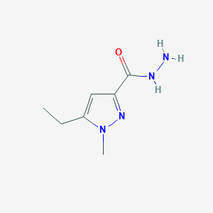molecular formula C7H12N4O B1530641 5-ethyl-1-methyl-1H-pyrazole-3-carbohydrazide CAS No. 1415719-49-1