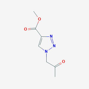 molecular formula C7H9N3O3 B1530767 Methyl 1-(2-oxopropyl)-1H-1,2,3-triazole-4-carboxylate CAS No. 1545084-64-7
