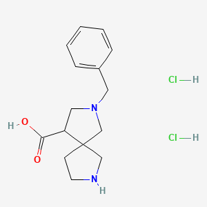 molecular formula C15H22Cl2N2O2 B1531556 2-Benzyl-2,7-diazaspiro[4.4]nonane-4-carboxylic acid dihydrochloride CAS No. 2098122-96-2