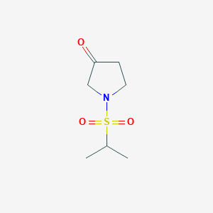 molecular formula C7H13NO3S B1531598 1-(Propane-2-sulfonyl)pyrrolidin-3-one CAS No. 1934691-33-4