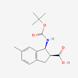 molecular formula C16H21NO4 B15317235 rac-(1R,2R)-1-{[(tert-butoxy)carbonyl]amino}-6-methyl-2,3-dihydro-1H-indene-2-carboxylic acid 