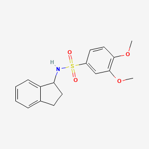 molecular formula C17H19NO4S B15318744 Benzenesulfonamide, 3,4-dimethoxy-N-(1-indanyl)- 