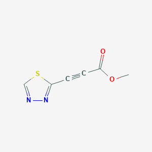molecular formula C6H4N2O2S B1532072 Methyl 3-(1,3,4-thiadiazol-2-yl)prop-2-ynoate CAS No. 2097990-06-0