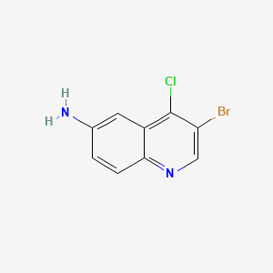 molecular formula C9H6BrClN2 B15321435 3-Bromo-4-chloroquinolin-6-amine 