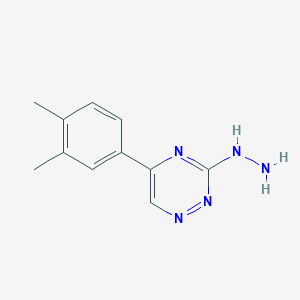 molecular formula C11H13N5 B1532525 5-(3,4-Dimethylphenyl)-3-hydrazinyl-1,2,4-triazine CAS No. 915924-87-7