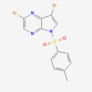 molecular formula C13H9Br2N3O2S B15331737 2,7-Dibromo-5-tosyl-5H-pyrrolo[2,3-b]pyrazine 