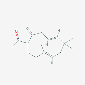 molecular formula C17H26O B15344871 1-[(4E,8E)-6,6,9-trimethyl-2-methylidenecycloundeca-4,8-dien-1-yl]ethanone 