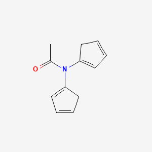 molecular formula C12H13NO B15348509 Acetamide,N,N-dicyclopentadienyl- 