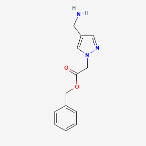 molecular formula C13H15N3O2 B15364823 Benzyl 2-(4-(aminomethyl)-1H-pyrazol-1-yl)acetate 