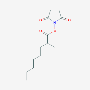 molecular formula C13H21NO4 B15366144 2,5-Dioxopyrrolidin-1-yl 2-methyloctanoate 