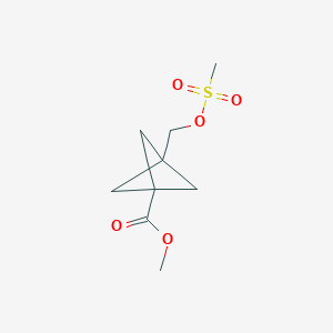 molecular formula C9H14O5S B15367202 Methyl 3-(((methylsulfonyl)oxy)methyl)bicyclo[1.1.1]pentane-1-carboxylate 
