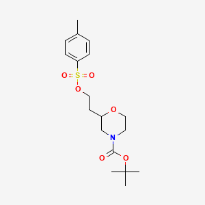 molecular formula C18H27NO6S B15367430 Tert-butyl 2-(2-(tosyloxy)ethyl)morpholine-4-carboxylate 