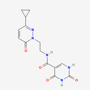 molecular formula C14H15N5O4 B15390775 N-(2-(3-cyclopropyl-6-oxopyridazin-1(6H)-yl)ethyl)-2,4-dioxo-1,2,3,4-tetrahydropyrimidine-5-carboxamide 