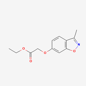 molecular formula C12H13NO4 B15396118 Ethyl [(3-methyl-1,2-benzoxazol-6-yl)oxy]acetate CAS No. 90736-60-0