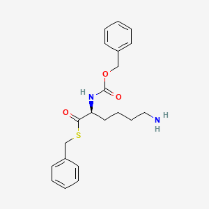molecular formula C21H26N2O3S B15441846 Thiobenzyl benzyloxycarbonyl-L-lysinate CAS No. 69861-90-1