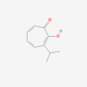 molecular formula C10H12O2 B156375 beta-Thujaplicine CAS No. 1946-74-3