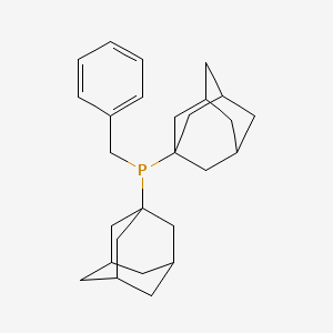 B1589746 DI(1-Adamantyl)benzylphosphine CAS No. 395116-70-8