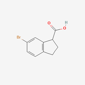 6-Bromo-2,3-dihydro-1H-indene-1-carboxylic acid