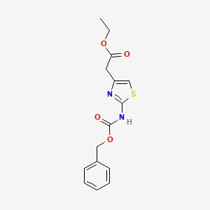 molecular formula C15H16N2O4S B1592543 Ethyl 2-(2-(((benzyloxy)carbonyl)amino)thiazol-4-yl)acetate CAS No. 92592-02-4