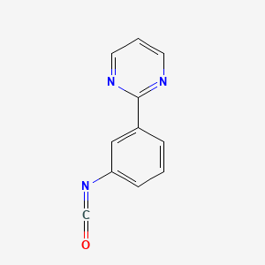 2-(3-Isocyanatophenyl)pyrimidine
