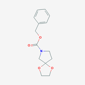 molecular formula C14H17NO4 B159573 Benzyl 1,4-dioxa-7-azaspiro[4.4]nonane-7-carboxylate CAS No. 139524-57-5