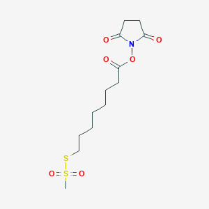 molecular formula C13H21NO6S2 B015966 N-Succinimidyloxycarbonylheptyl Methanethiosulfonate CAS No. 887407-50-3