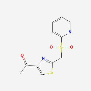 1-{2-[(2-Pyridylsulfonyl)methyl]-1,3-thiazol-4-yl}ethan-1-one