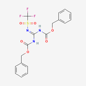benzyl N-[N-phenylmethoxycarbonyl-N'-(trifluoromethylsulfonyl)carbamimidoyl]carbamate