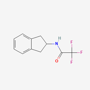 molecular formula C11H10F3NO B1599927 N-(2,3-dihydro-1H-inden-2-yl)-2,2,2-trifluoroacetamide CAS No. 193756-44-4