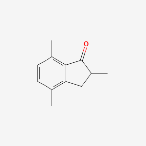 molecular formula C12H14O B1600007 2,4,7-Trimethyl-2,3-dihydro-1H-inden-1-one CAS No. 89044-50-8