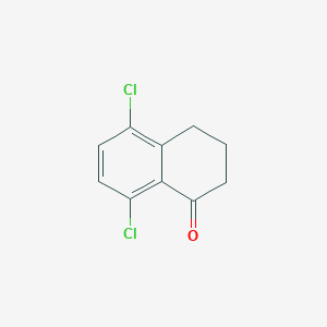 molecular formula C10H8Cl2O B1600046 5,8-二氯-3,4-二氢-2H-萘酮 CAS No. 112933-45-6