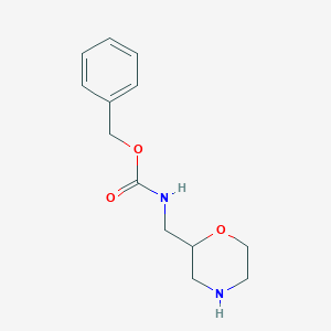 molecular formula C13H18N2O3 B1600517 Benzyl (morpholin-2-ylmethyl)carbamate CAS No. 1027375-80-9