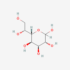 molecular formula C7H14O7 B1602495 (3R,4S,5R,6S)-6-[(1R)-1,2-Dihydroxyethyl]oxane-2,3,4,5-tetrol CAS No. 87172-53-0