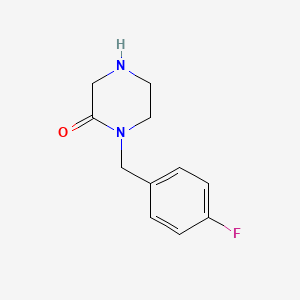 molecular formula C11H13FN2O B1602774 1-(4-Fluorobenzyl)piperazin-2-one CAS No. 309915-37-5