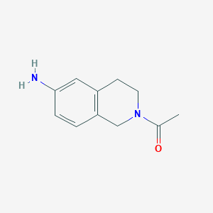 molecular formula C11H14N2O B1603435 2-Acetyl-1,2,3,4-tetrahydroisoquinolin-6-amine CAS No. 245547-23-3