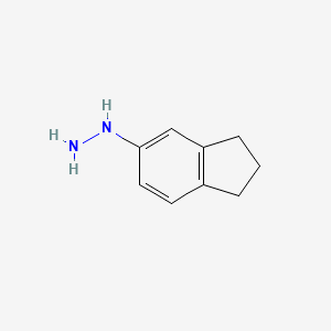 B1603503 2,3-Dihydro-1H-inden-5-ylhydrazine CAS No. 887593-51-3