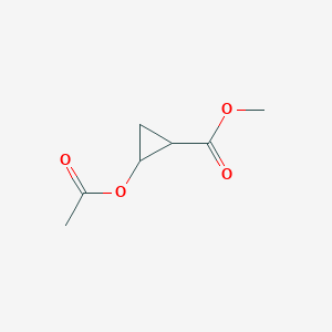 B1604976 2-(Acetyloxy)cyclopropanecarboxylic acid methyl ester CAS No. 98272-73-2