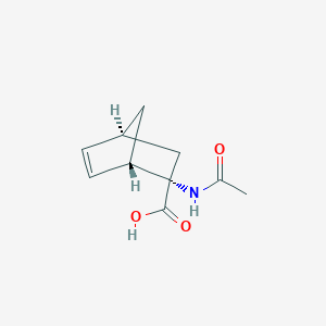 molecular formula C10H13NO3 B160776 Bicyclo[2.2.1]hept-5-ene-2-carboxylic acid, 2-(acetylamino)-, (1S-endo)-(9CI) CAS No. 131177-83-8
